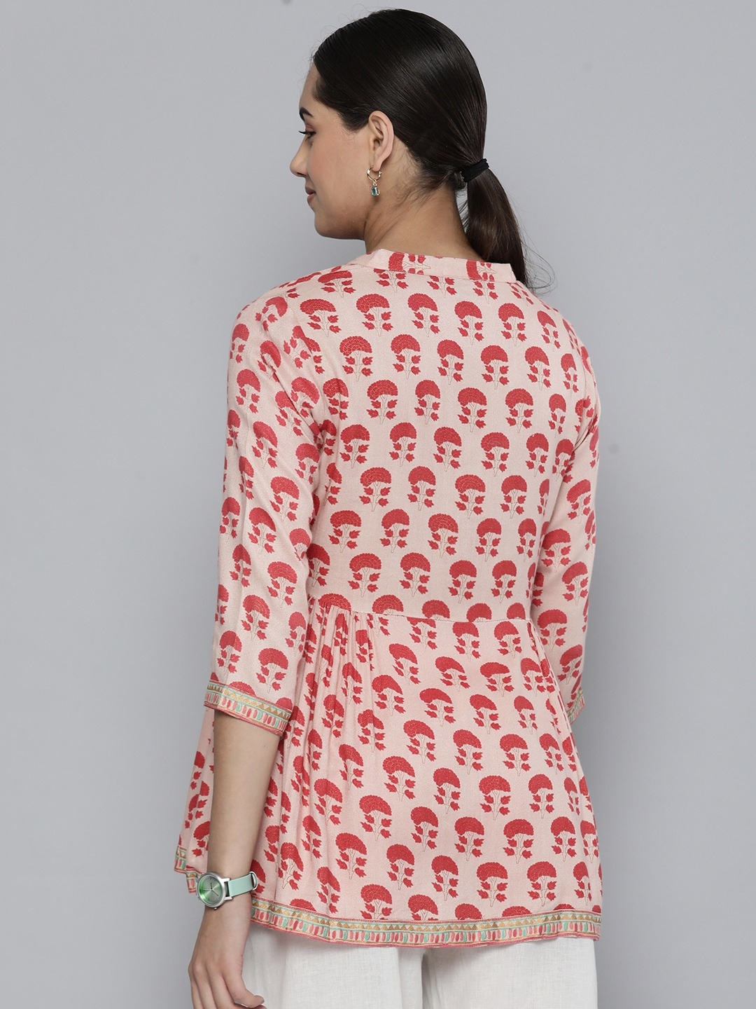 Peach top with Red Motifs