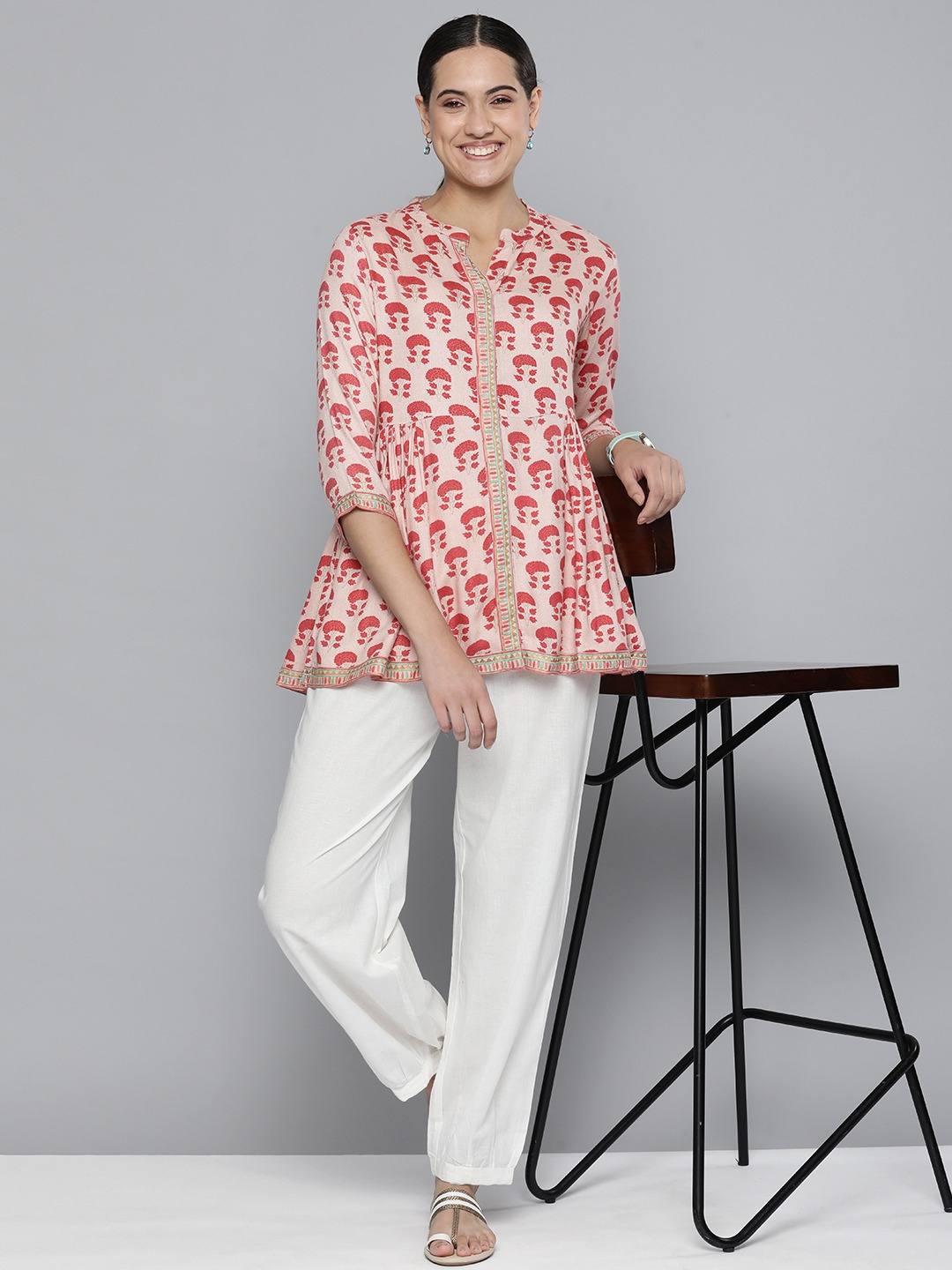 Peach top with Red Motifs